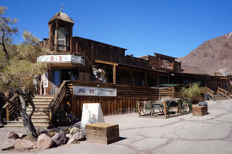 Wooden Old West storefront with a bell tower on Calico Ghost Town's main street
