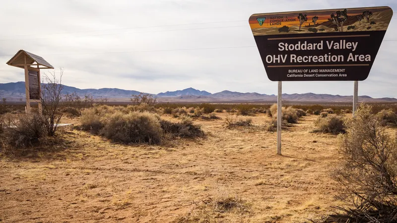 BLM entrance sign for the Stoddard Valley OHV Recreation Area in open desert